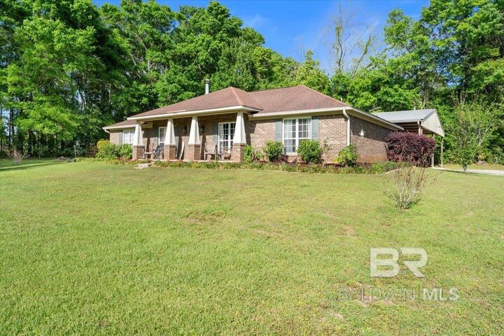 Property Photo:  25736 Dawson Road  AL 36551 