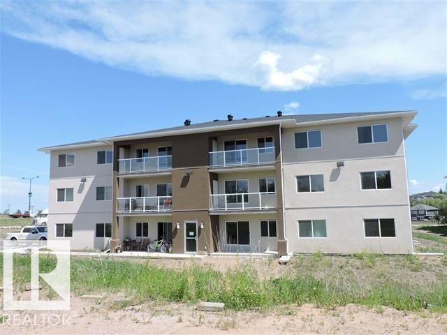 Property Photo: 1601 8 Avenue 2103 AB T9M 0J9
