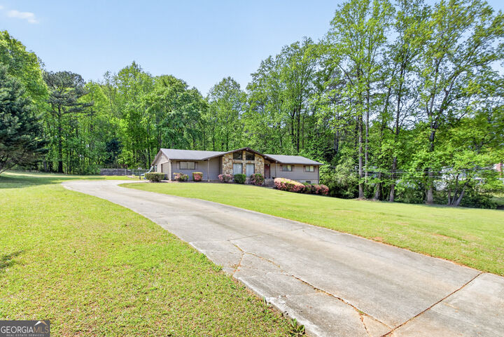 Property Photo:  249 Poplar Street NW  GA 30047 