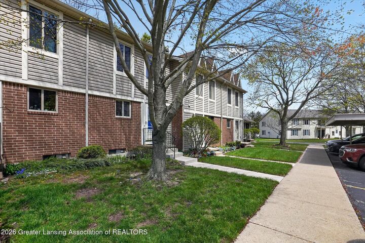 Property Photo:  5966 Village Drive  MI 48840 