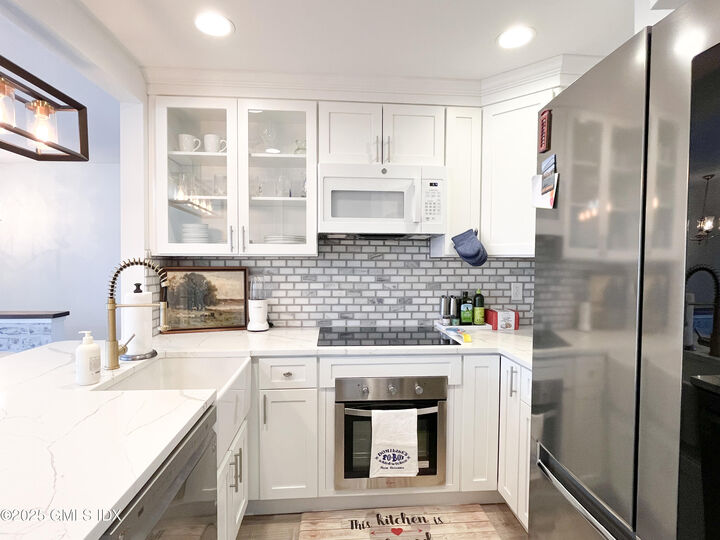 Property Photo:  1465 E Putnam Avenue 122  CT 06870 