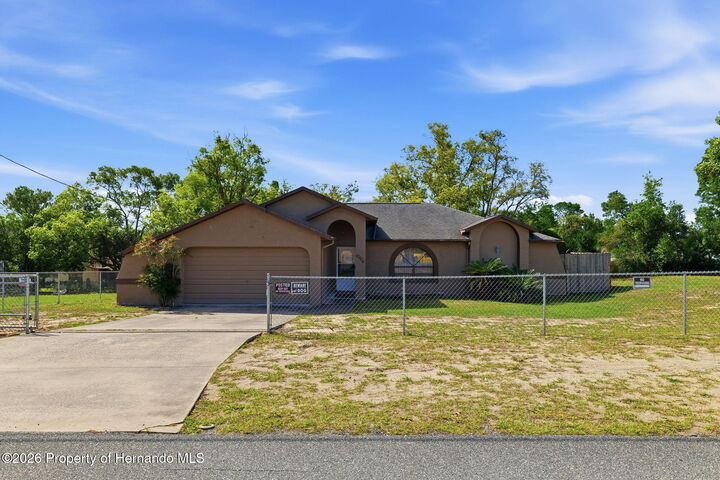 Property Photo:  10464 Maderia Street  FL 34608 