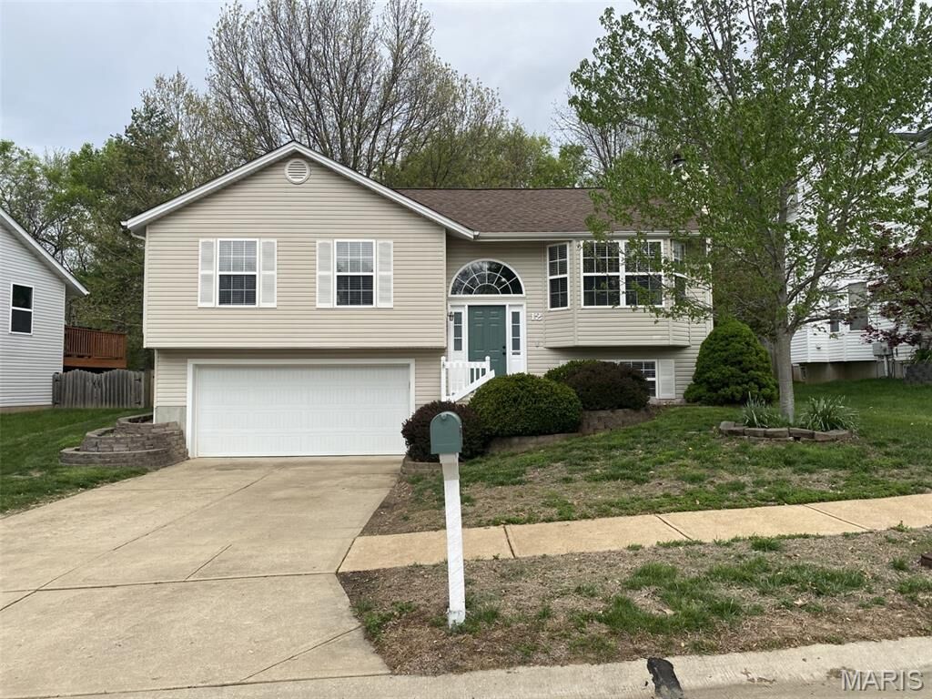 Property Photo:  12 Red Cedar Court  MO 63303 