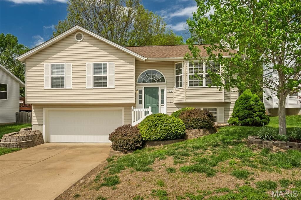 Property Photo:  12 Red Cedar Court  MO 63303 