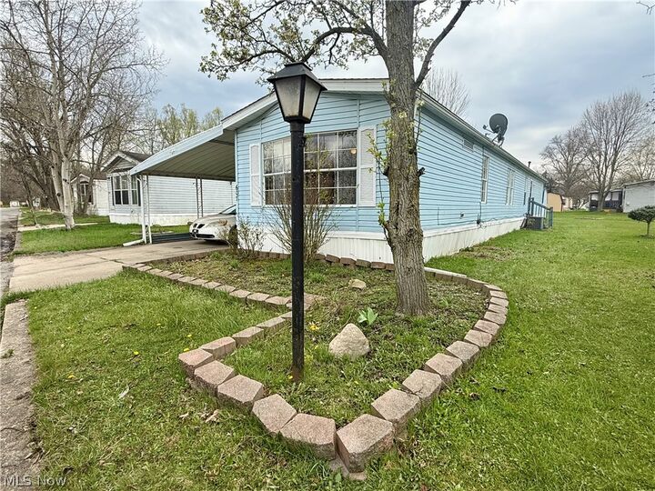 Property Photo:  607 Sugar Pines Drive SW  OH 44076 