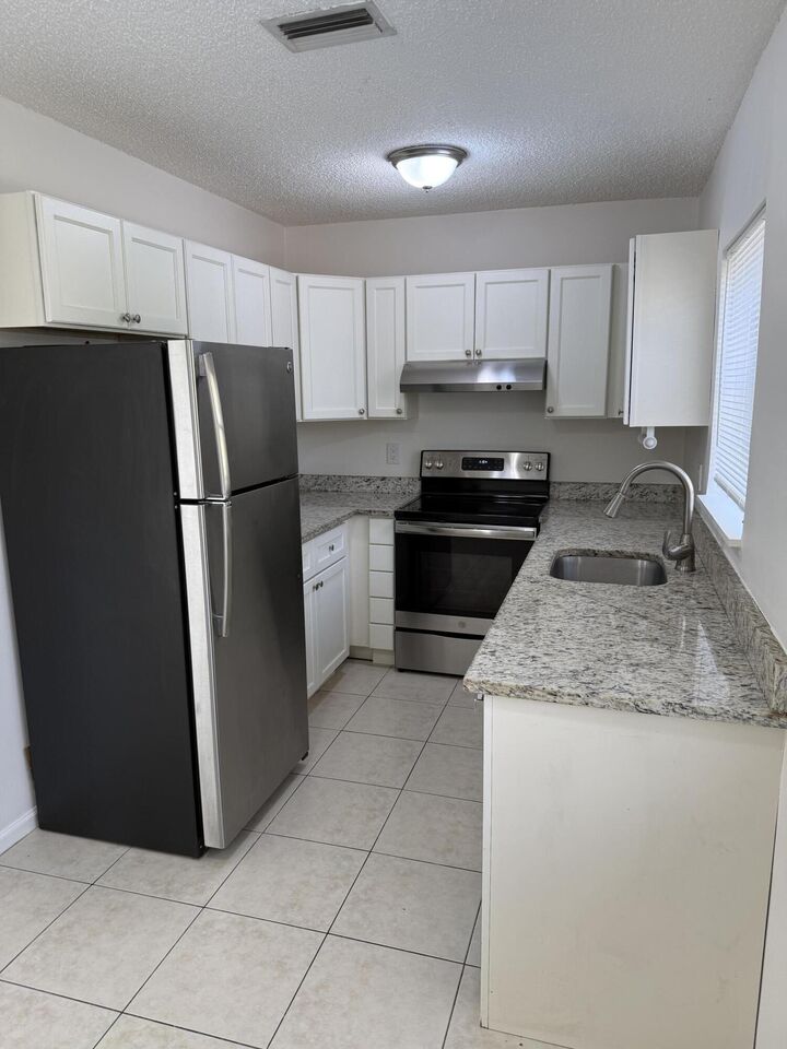 Property Photo:  6575 NE 7th Avenue  FL 33487 