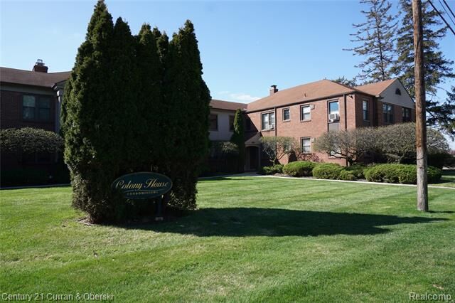 Property Photo:  22673 Garrison Street #208  MI 48124 