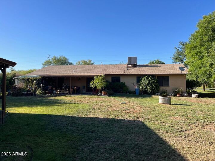 Property Photo: 9115 W Broadway Road AZ 85353