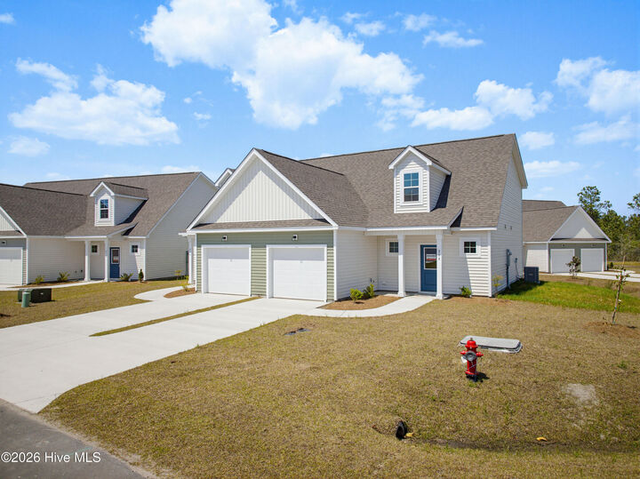 Property Photo:  208 Sandpiper Place  NC 28445 