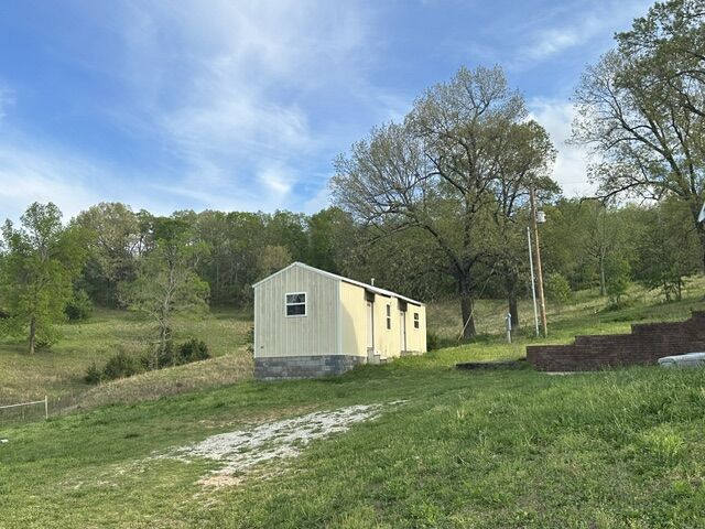 Property Photo:  1465 County Road 933  AR 72611 