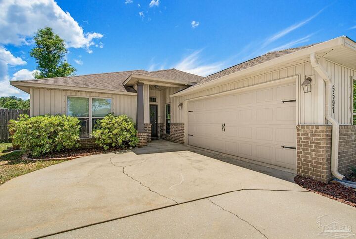 Property Photo:  5597 Peach Dr  FL 32571 
