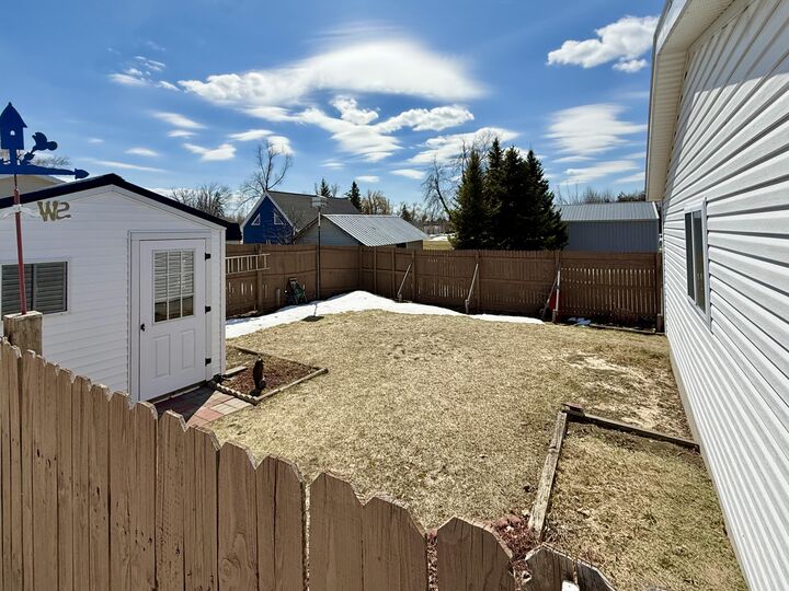 Property Photo:  305 Cedar Street  MI 49721 