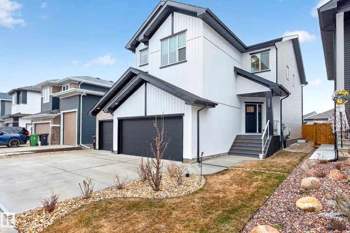 Property Photo:  345 Meadowview Drive  AB T8L 0Y4 