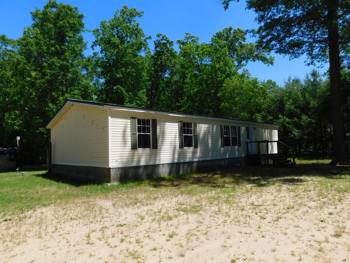 Property Photo:  647 N Hart Road  MI 49689 