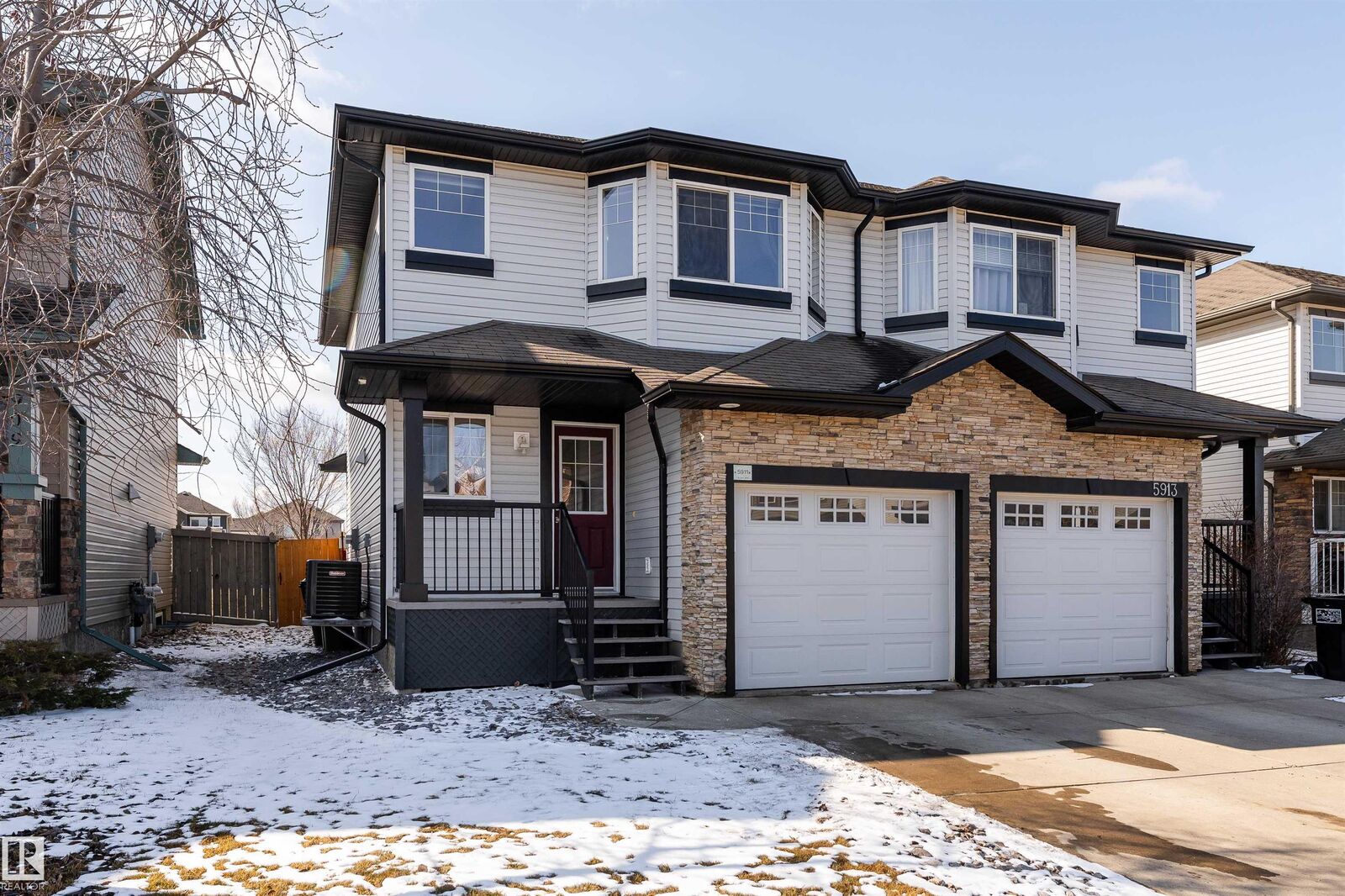 Property Photo:  5911 8 Avenue SW  AB T6X 0G5 