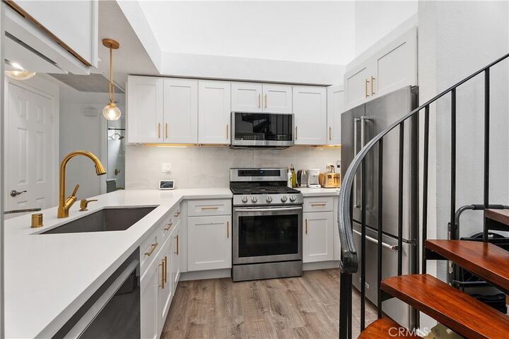 Property Photo:  17172 Abalone 211  CA 92649 