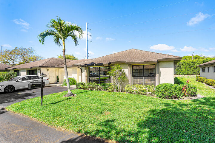 Property Photo:  4922 Dovewood Road B  FL 33436 