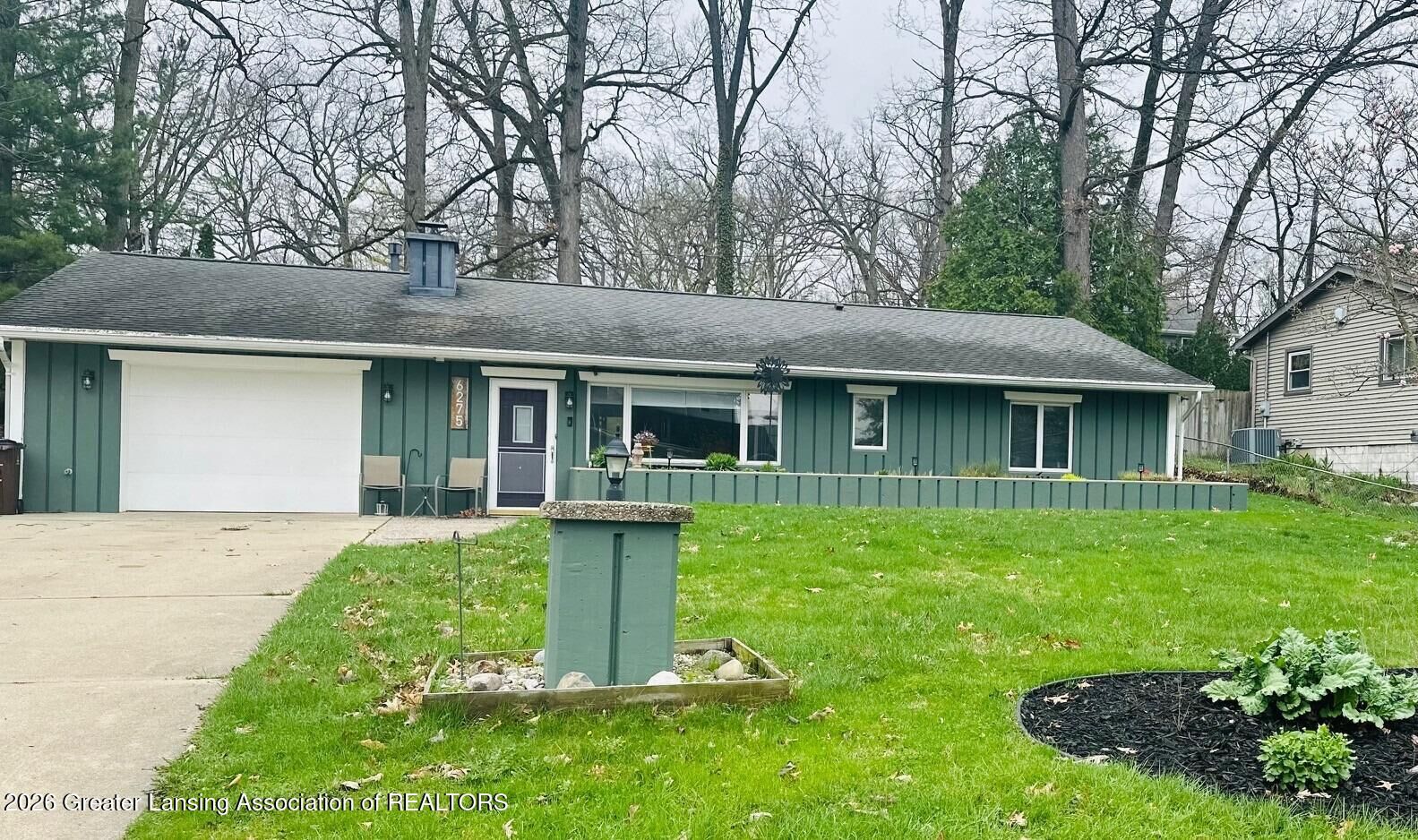 Property Photo:  6275 Lake Drive  MI 48840 