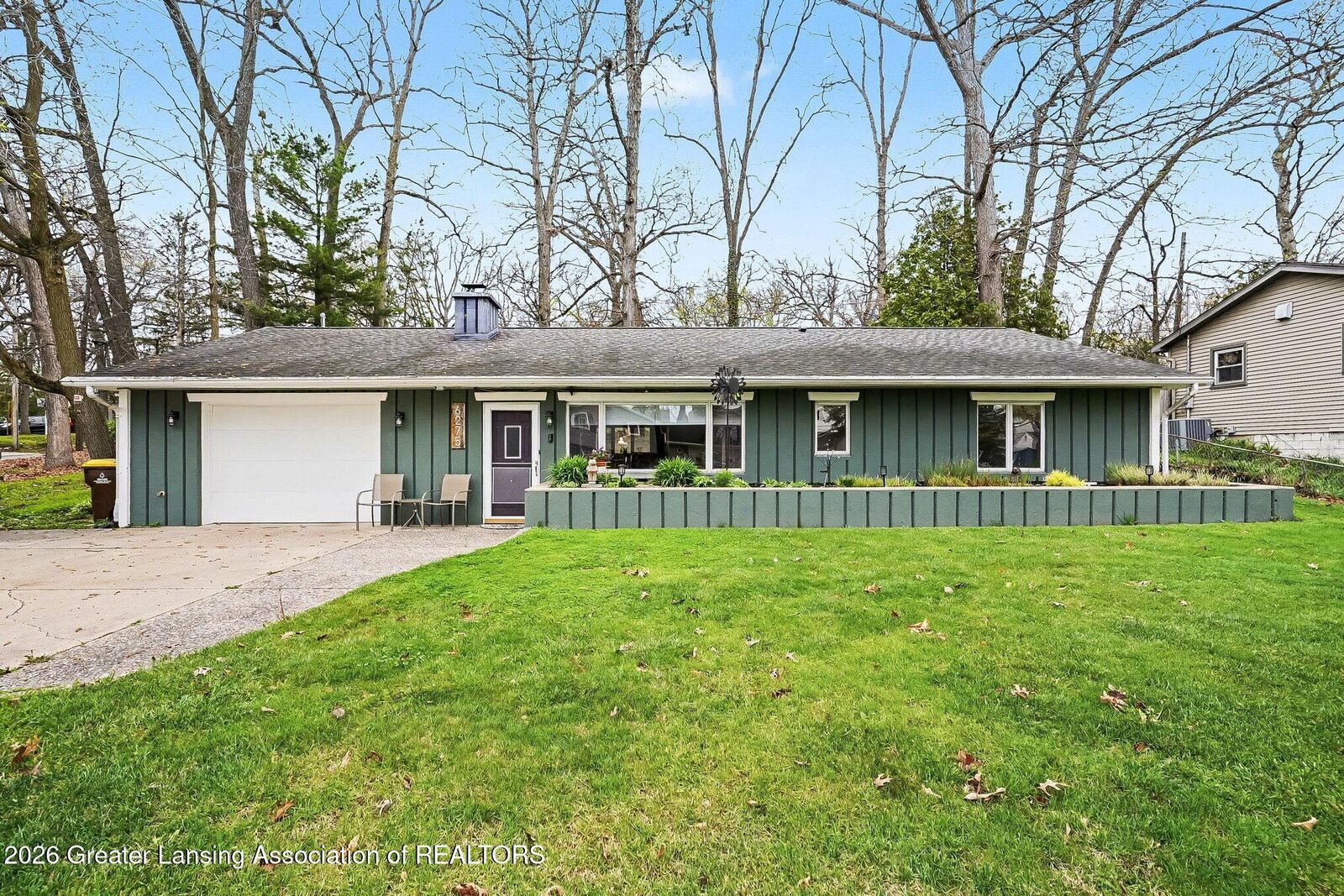 Property Photo:  6275 Lake Drive  MI 48840 