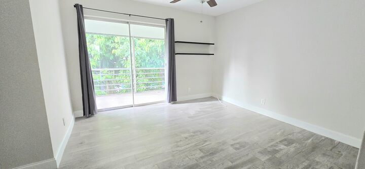Property Photo:  115 SW 1st Avenue 7  FL 33435 