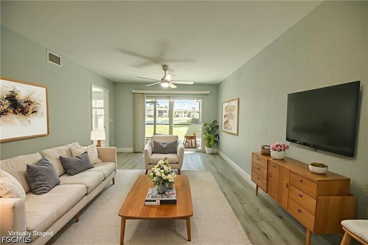 Property Photo:  16881 Davis Road 116  FL 33908 