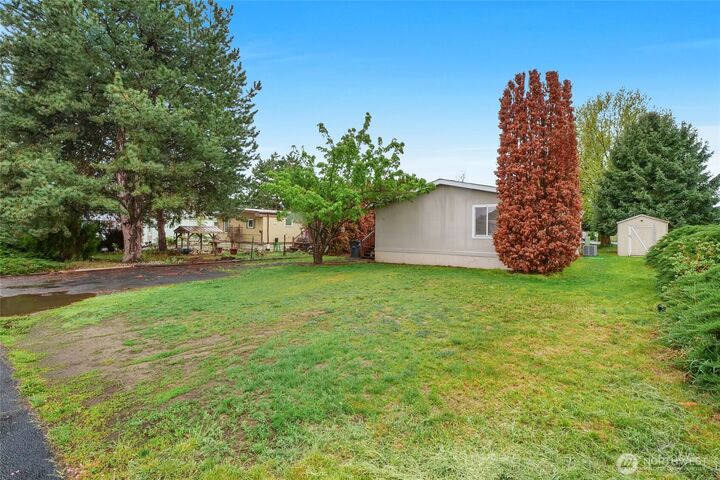 Property Photo:  4815 NE Airway Drive 121  WA 98837 