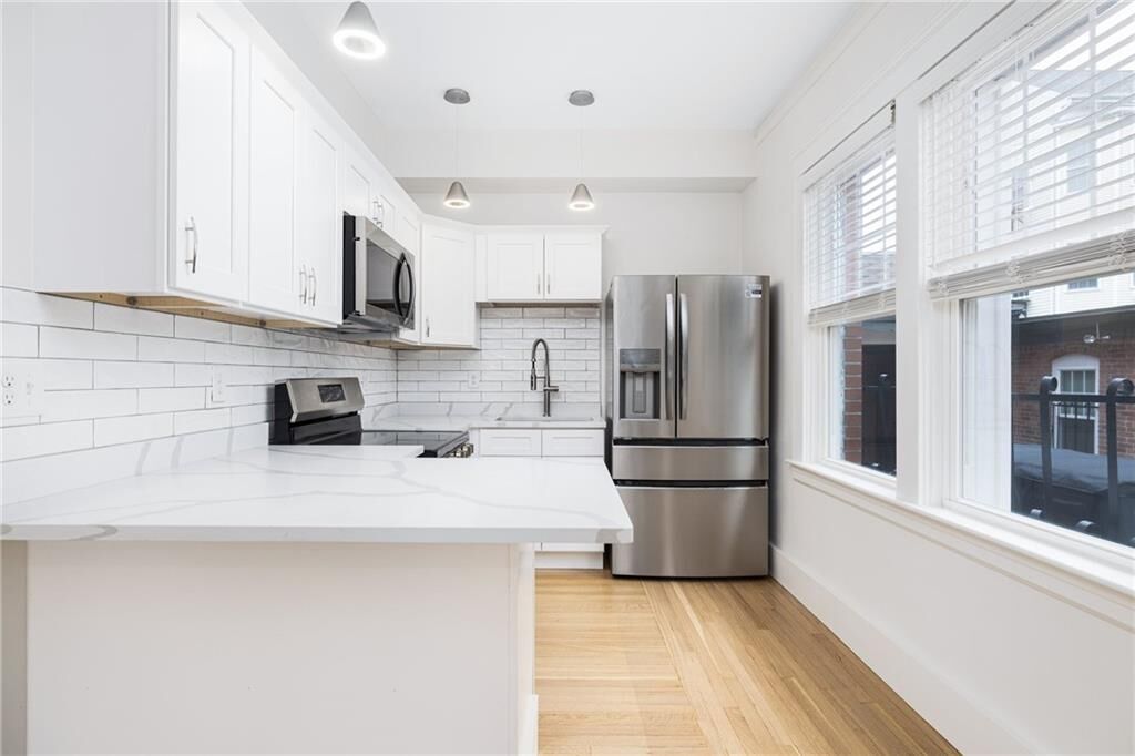 Property Photo:  54 Sutton Street 1  RI 02903 