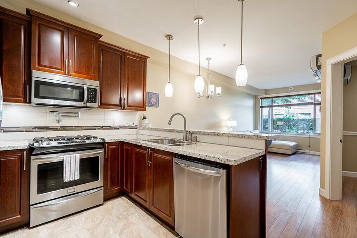 Property Photo:  8157 207 Street 103  BC V2Y 0V4 