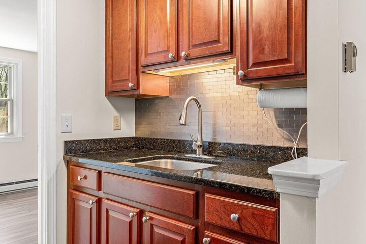 Property Photo:  93 Henrylaw Avenue  NH 03820 