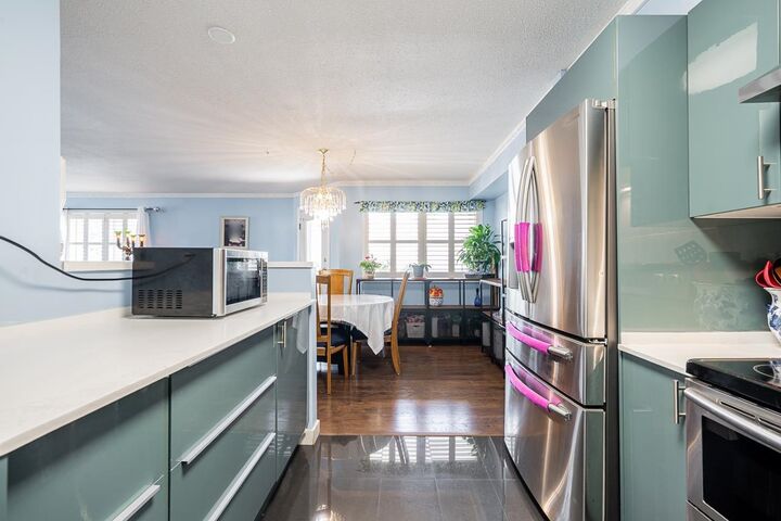 Property Photo: 19128 Ford Road 301 BC V3Y 2P1