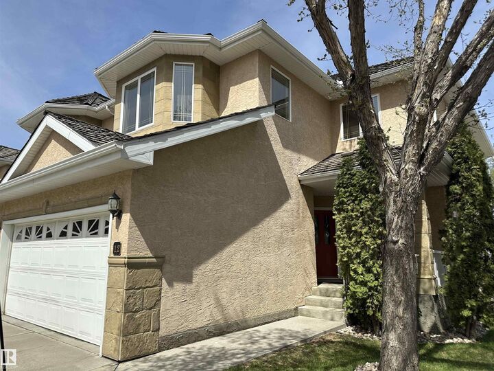 Property Photo: 577 Butterworth Way NW 12 AB T6R 2Y2