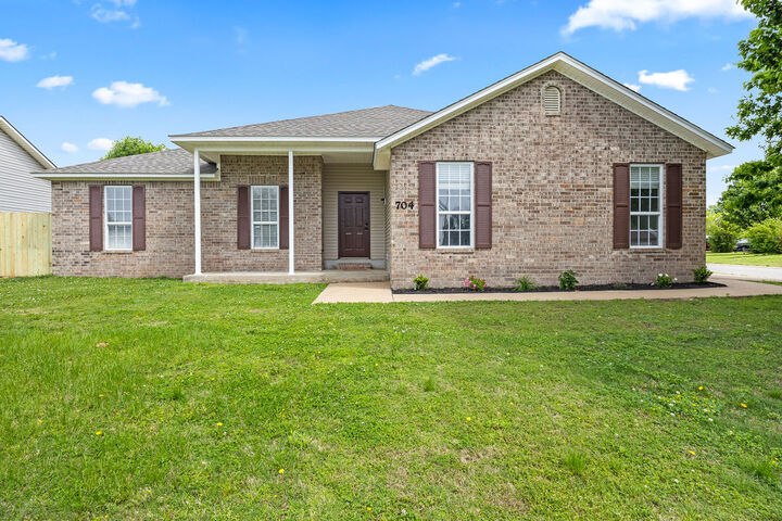 Property Photo:  704 SW Charlotte Street  AR 72736 