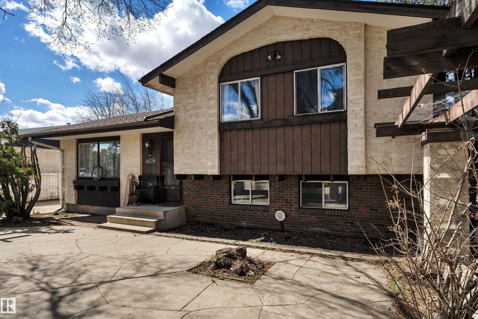 Property Photo: 5718 Garden Meadows Drive AB T9A 2L6