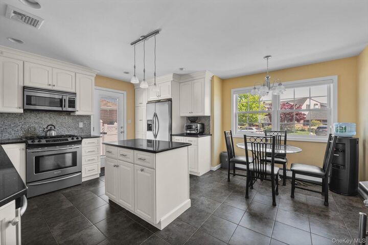 Property Photo:  418 Parker Avenue  NY 11756 