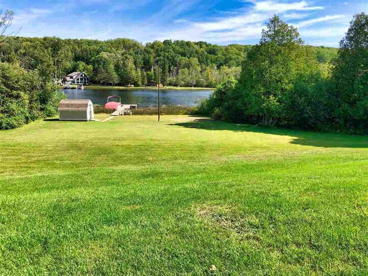 Property Photo:  9412 Six Mile Lake  MI 49729 