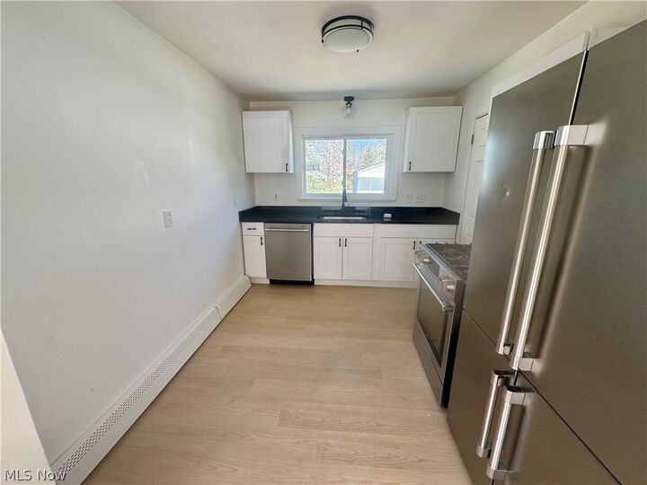 Property Photo: 7407 Hawk Avenue OH 44060