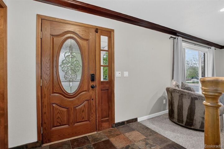 Property Photo:  5452 S Zeno Street  CO 80015 