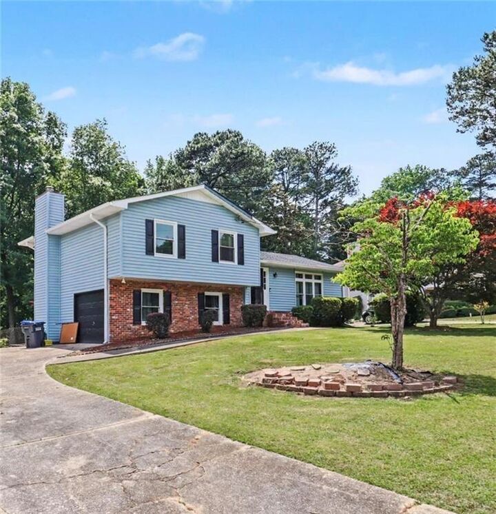 Property Photo:  5913 Old Forrest Way  GA 30135 