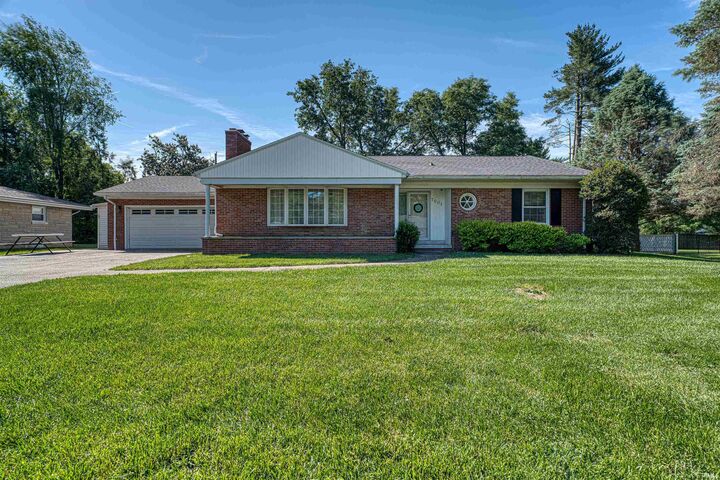 Property Photo:  7001 Monroe Avenue  IN 47715 