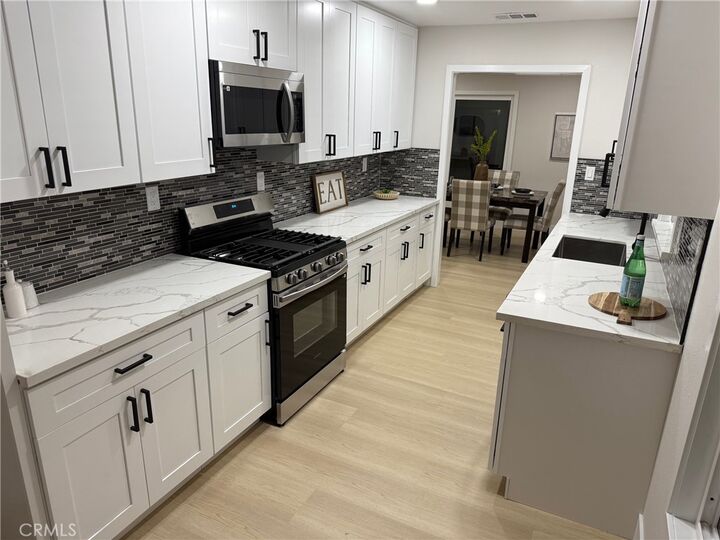 Property Photo:  1232 W Papeete  CA 90744 