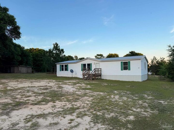 Property Photo:  5180 Phoenix Dr  FL 32583 