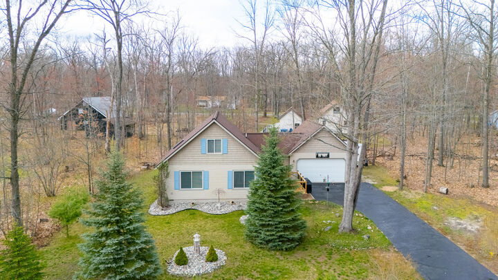 Property Photo:  220 Robin Hood  MI 48653 