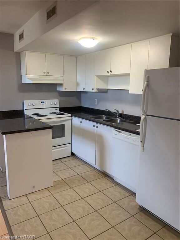 Property Photo:  81 Dundas Street 7  ON L9H 7T5 