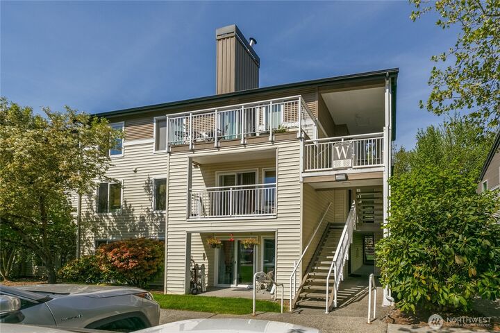 Property Photo:  12303  Harbour Pointe Boulevard W204  WA 98275 