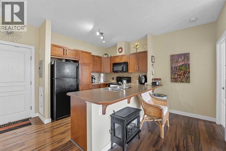 Property Photo:  48 Panatella Road Northwest  AB T3K 0V4 