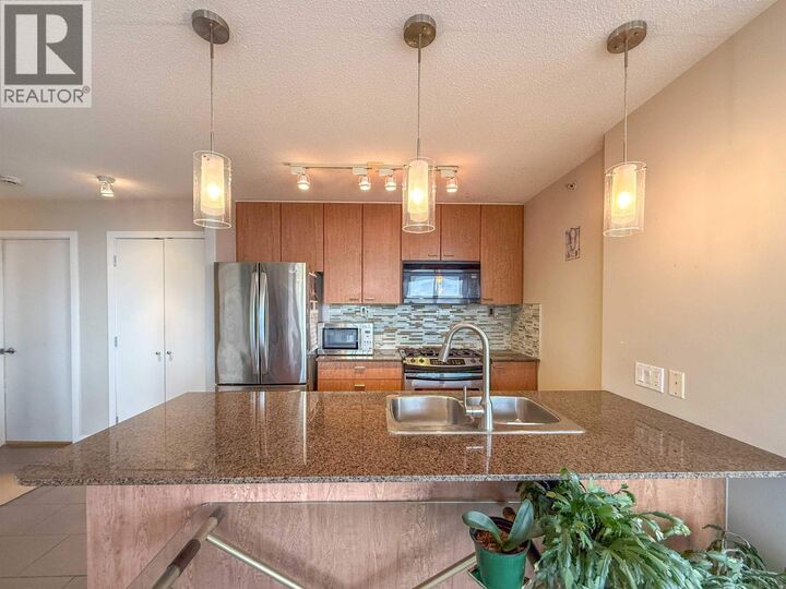 Property Photo:  7063 Hall Avenue 1403  BC V5E 0A5 