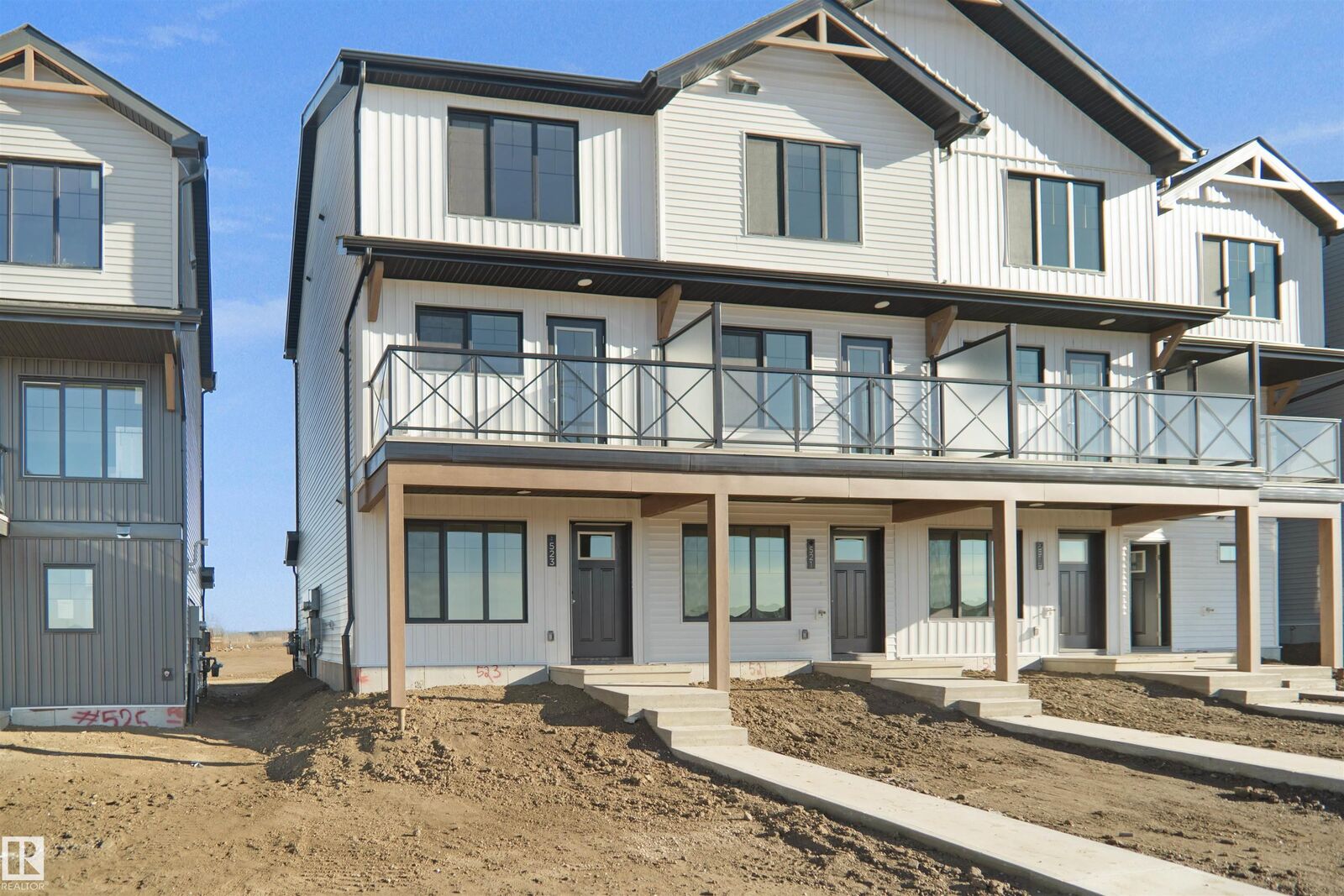 Property Photo: 2034 Marquis Way NE AB T5Y 3K7