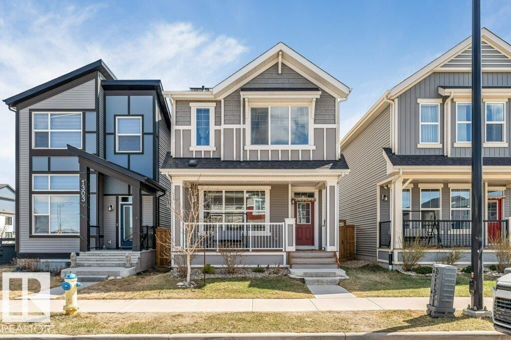 Property Photo: 1305 Darby Way SW AB T6W 4N3