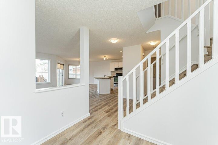 Property Photo:  6354 Sandin Way NW  AB T6R 0K1 
