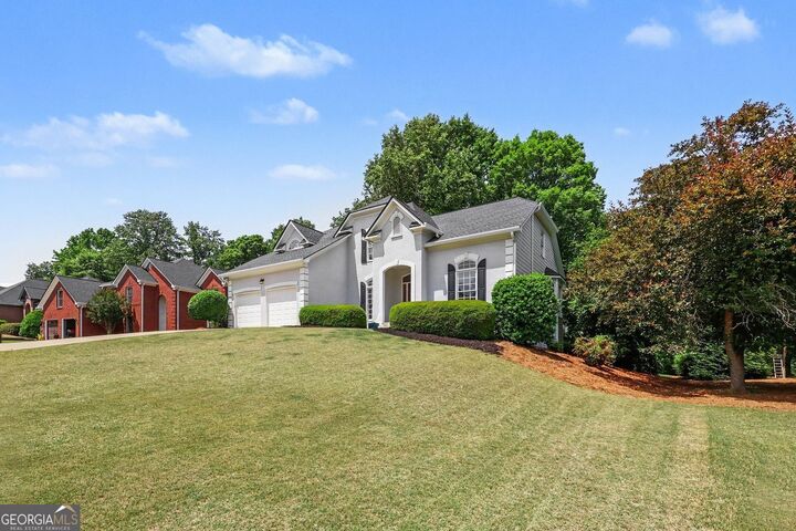 Property Photo:  5640 The 12 Fairway  GA 30024 